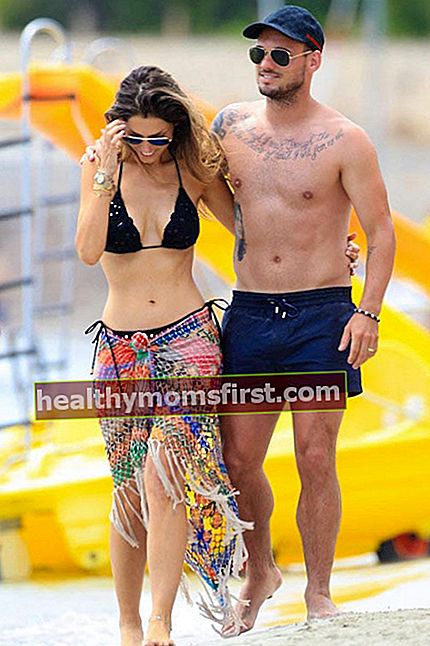 Wesley Sneijder dan istrinya Yolanthe Cabau van Kasbergen selama liburan di Ibiza