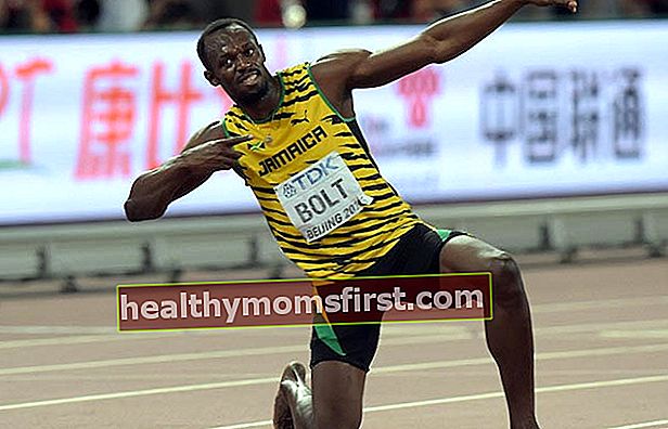 Usain Bolt merayakan kemenangannya setelah kemenangan pertandingan