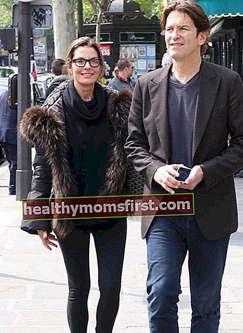 Lingkungan Sela bersama suaminya Howard Sherman di Paris pada 17 Mei 2013