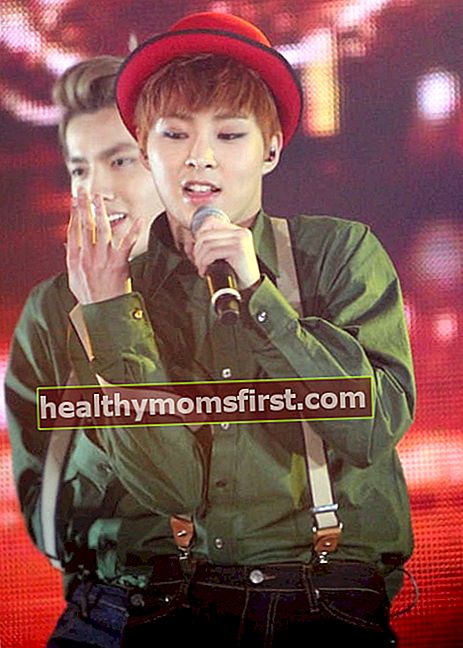 Xiumin di SMTown Week seperti yang dilihat pada bulan Disember 2013