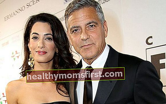 Amal Alamuddin dan George Clooney menghadiri gala Celebrity Fight Night merayakan Malam Pertarungan Selebriti Di Italia.